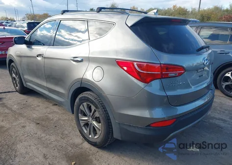 2015 Hyundai Santa Fe Sport 2.4L z USA, uszkodzony, nr VIN 5XYZUDLB9FG238562